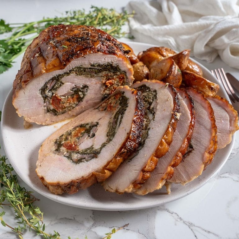 1.2kg Stuffed Turkey Rolled with Parmesan, Baby Spinach, Semi-dry Tomatoes and Bacon, to be cooked, serves 4-6.
