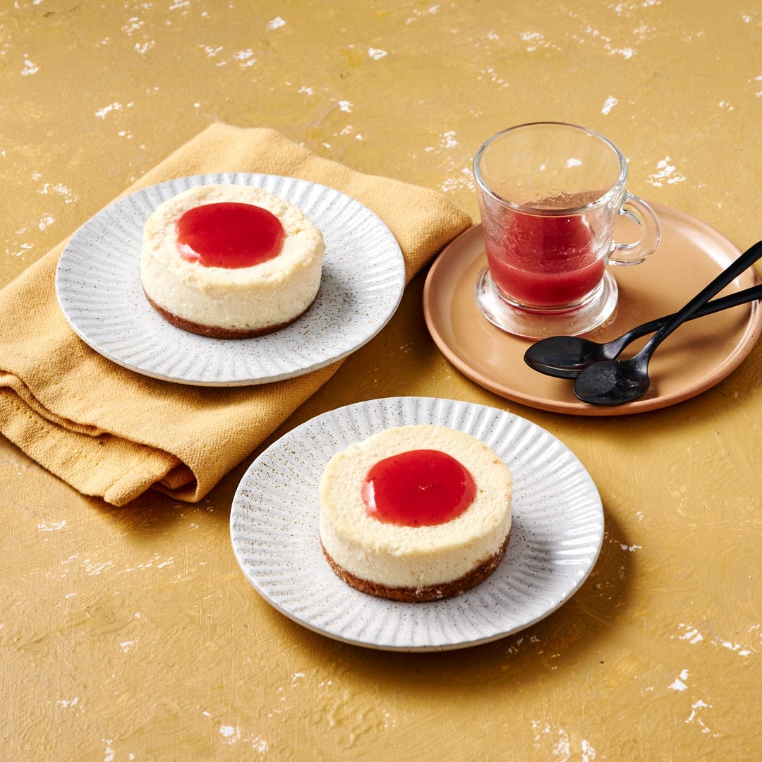 Dessert Cheesecakes and strawberry coulis