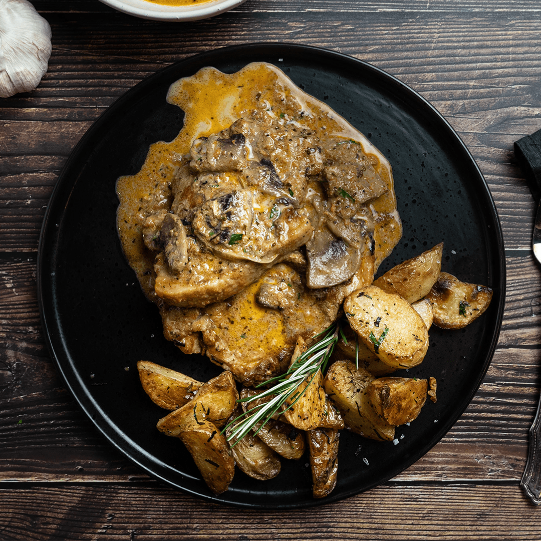 Ready to eat Meal Garlic Pork Chops with Creamy Mushroom Sauce