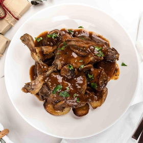 Duck Confit with Wild Mushroom Sauce and roasted potatoes, serves 2